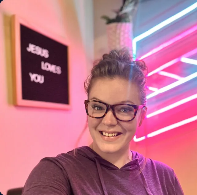 A Shed Suite support team member at her desk