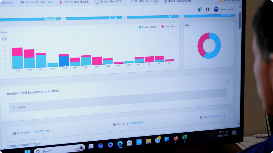 Legacy Sheds order dashboard shown on a monitor