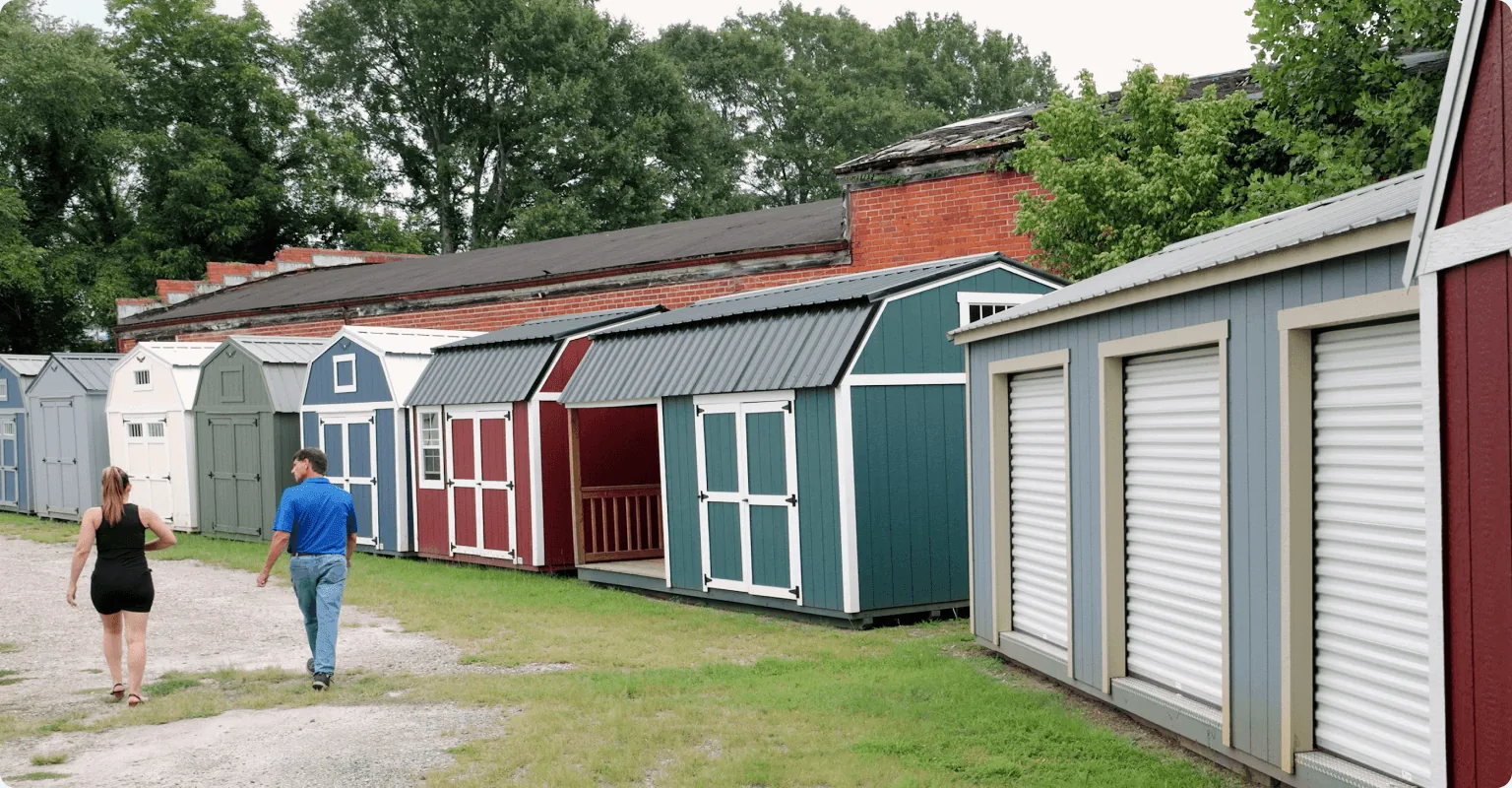 Customers walking the Legacy Sheds sales lot